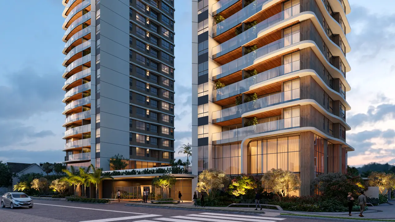 Acesso do Elevare ao nível da rua, com paisagismo, porte-cochère e a torre ao fundo
