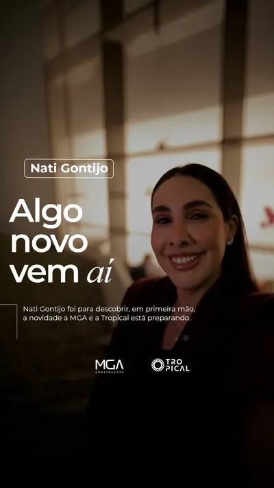 Reel “Algo novo vem aí”, com Nati Gontijo diante do edifício ao entardecer