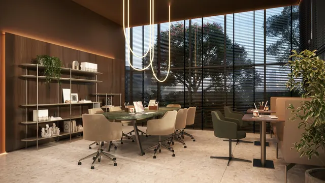 Coworking do Elevare, com mesa de reunião e vista para a arborização