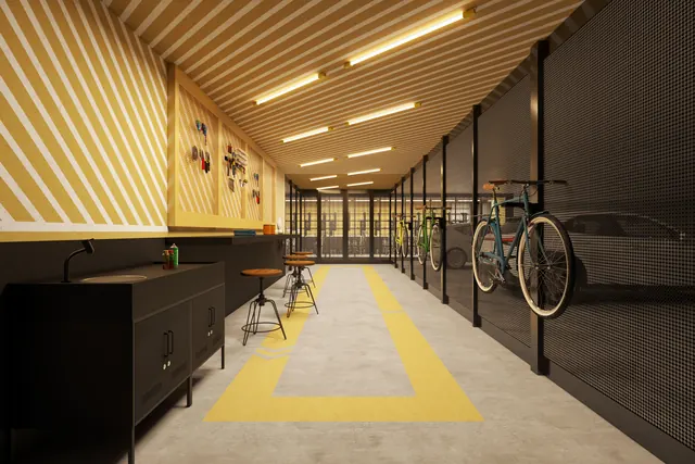 Oficina do Elevare, com bancada de ferramentas e suporte para manutenção de bikes