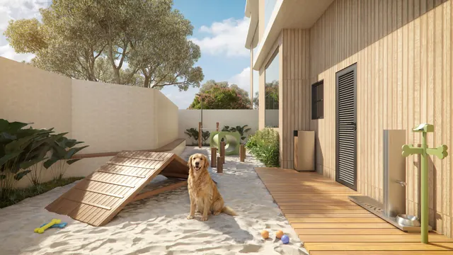 Pet place do Elevare, com grama, obstáculos de agility e bancos na sombra